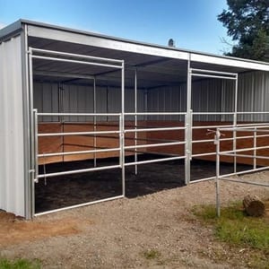 KRE 12x24 Shelter With Stalls And 3 Rail Divider, Tin And Plywood Siding