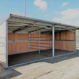 KRE 12x24 Open Front Plywood Shelter With 5 Rail Divider And Tin Roof Overhang.