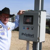 Cowboy Operating A Panel Walker Control Box